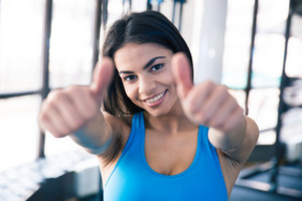 fit girl thumbs up, healthy weight gain, exercise to gain weight